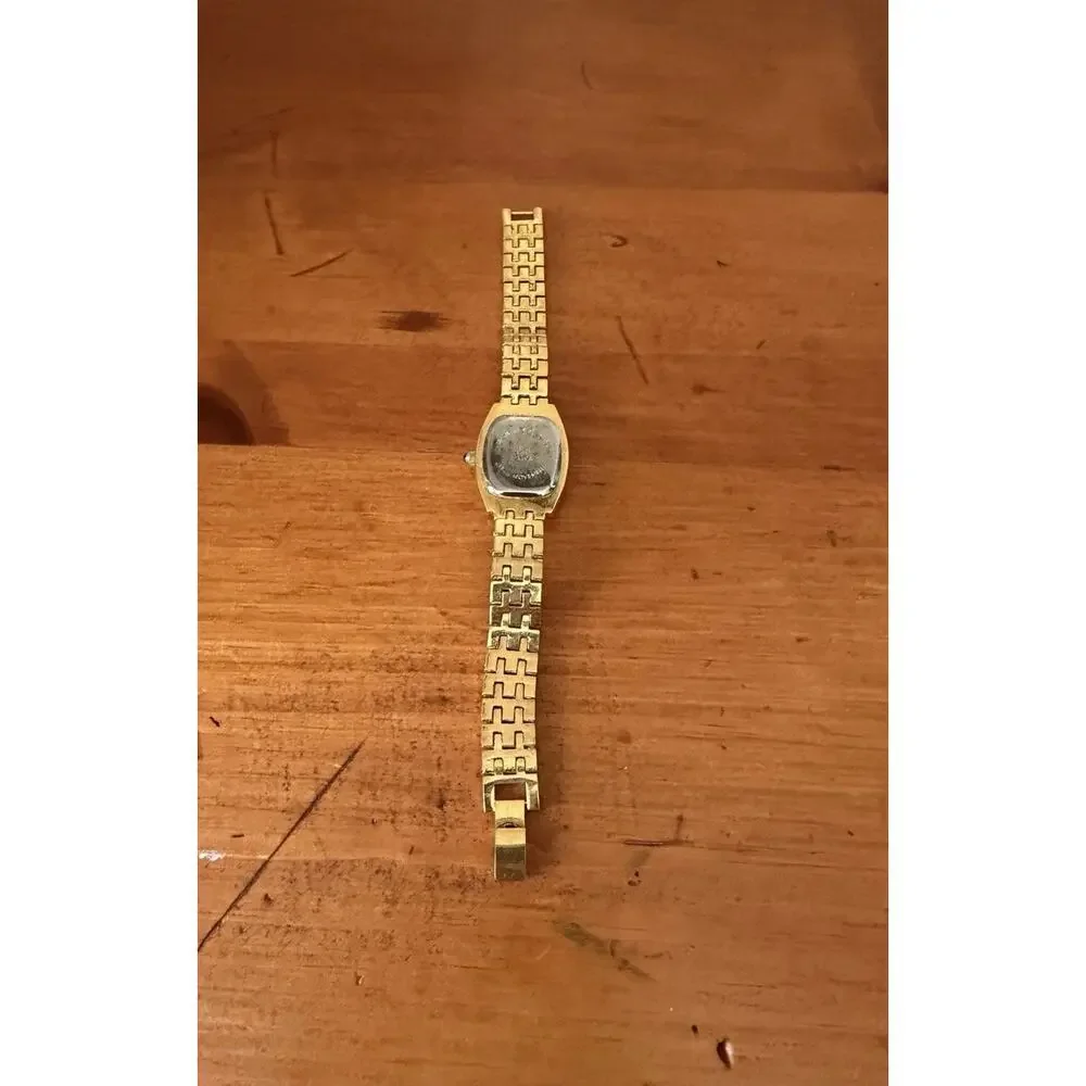 Nolan Miller Glamour Collection Crystal Gold Tone Bracelet Watch Mother Of Pearl